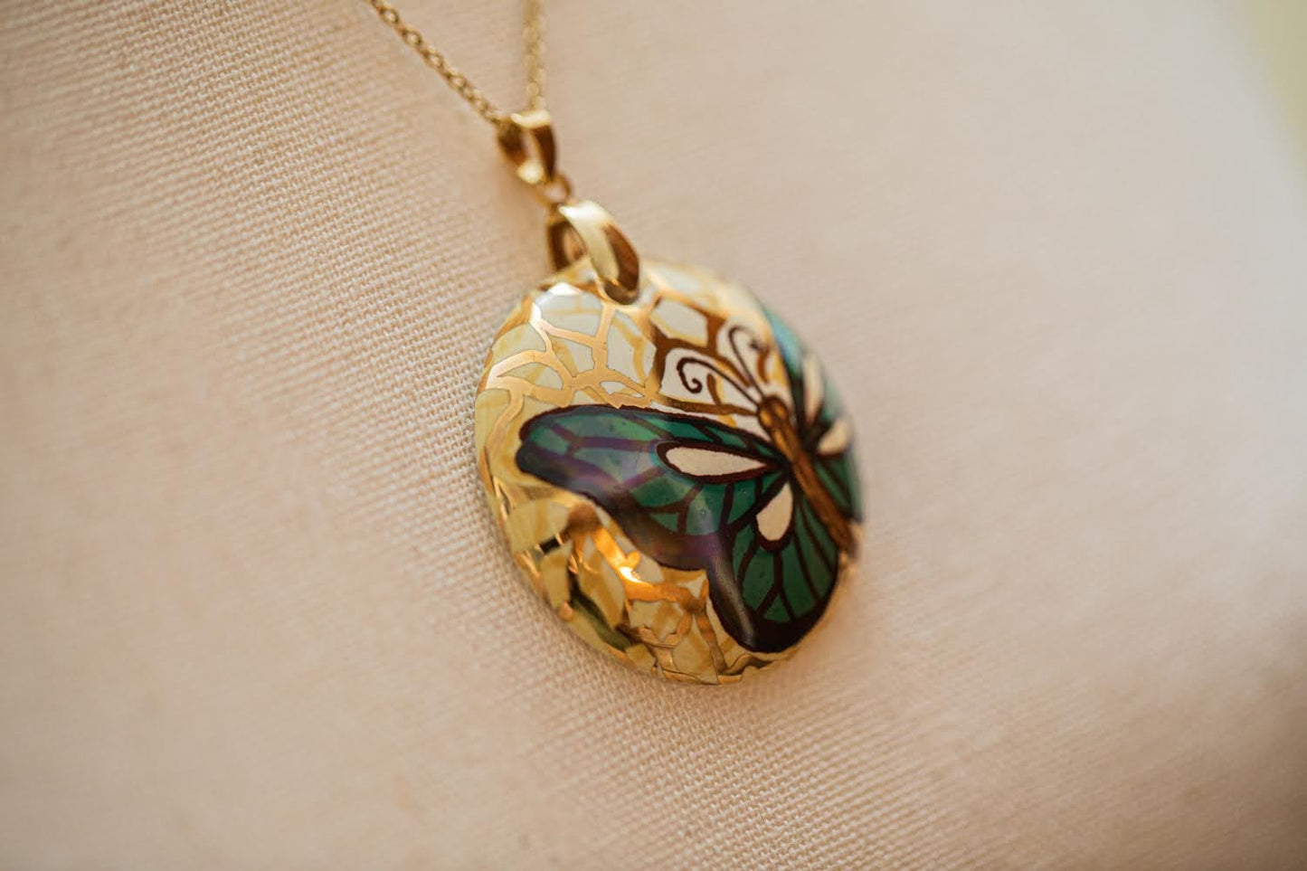 Linea LUXURY Gold and Green Butterfly Small Round Necklace