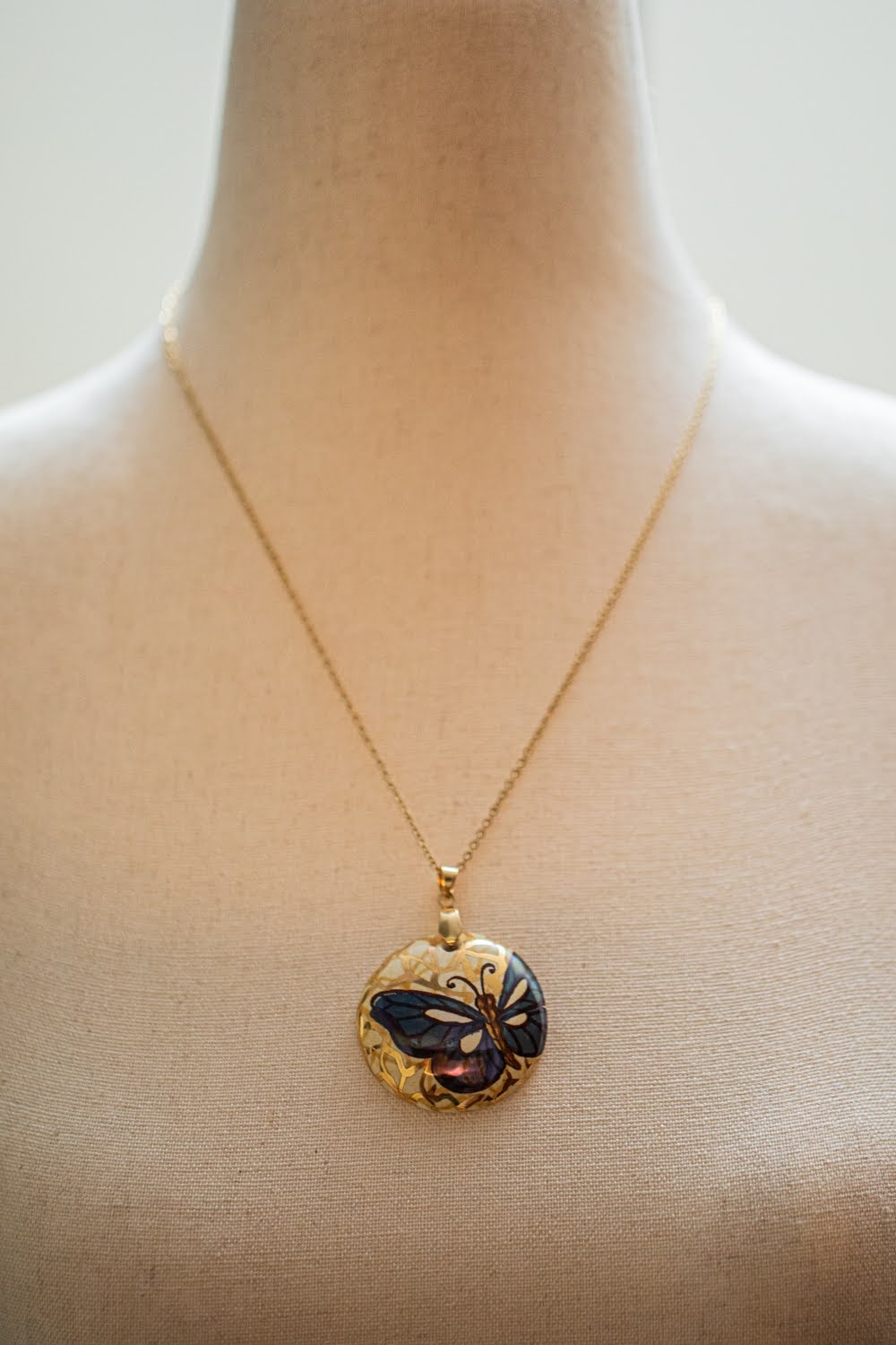 Linea LUXURY Gold and Blue Butterfly Small Round Necklace